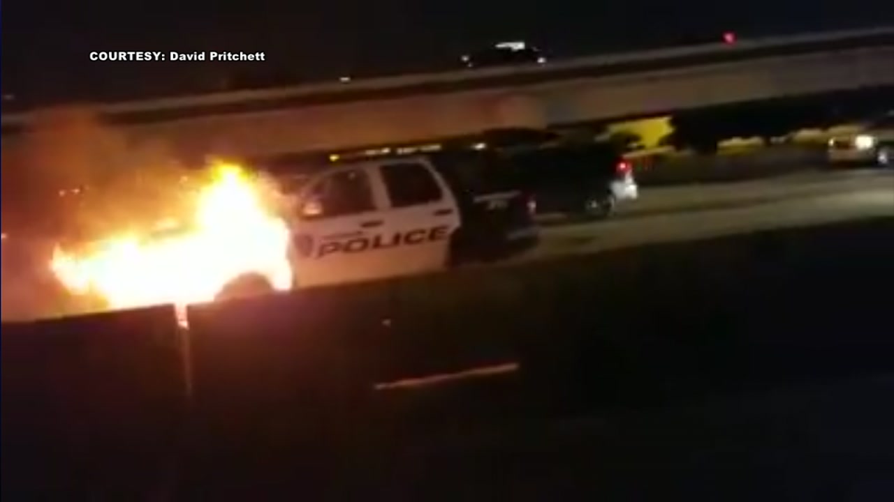 HPD patrol car catches on fire after crash on the North Freeway